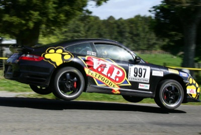 Tony Quinn gets his Porsche 911 airborne in the Targa. Photo by GroundSky