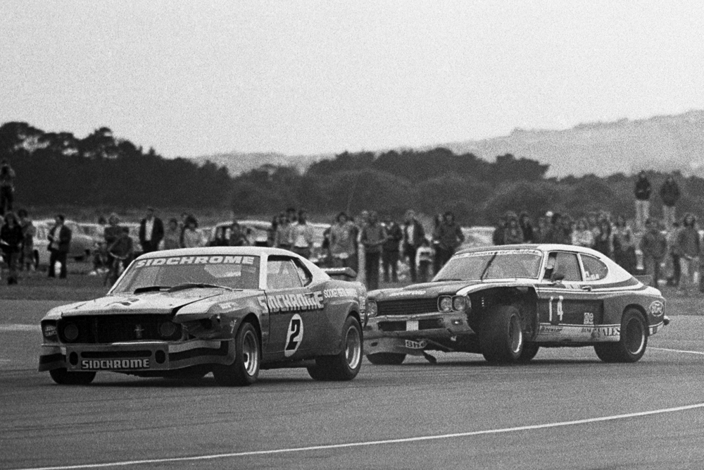 Wigram, January 1975. Paul Fahey, Cologne Capri hunts down Jim Richards, Mustang. IMAGE/terry marshall