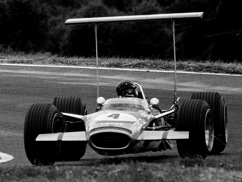 Pukekohe NZIGP 1969. Jochen Rindt, Lotus 49T. The fabulous high wing era. IMAGE/terry marshall