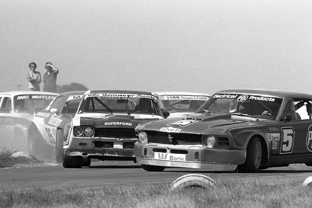Timaru 1975. The infamous clash into turn 1 between Leo Leonard and the PDL Ford Mustang and Paul Fahey in his Cologne Capri, in Leo's opinion decided the 1975 Championship. IMAGE/terry marshall